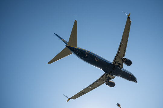 Bergamo, Italy - April 6, 2026: Dynamic shot of a commercial airplane landing at Orio al Serio Airport (BGY) in Bergamo, Italy, on a bright and sunny spring day