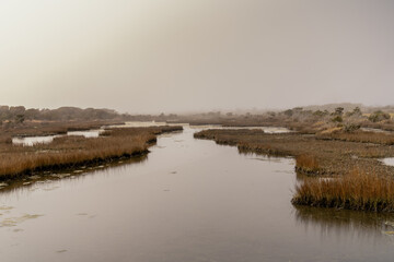 view of the Alligator Bay salt marsh in North Topsail Beach on a foggy winter morning
