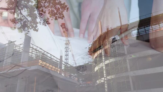 Crossfade ghosting hands unrolling plans over cranes, smoothing and marking for site planning