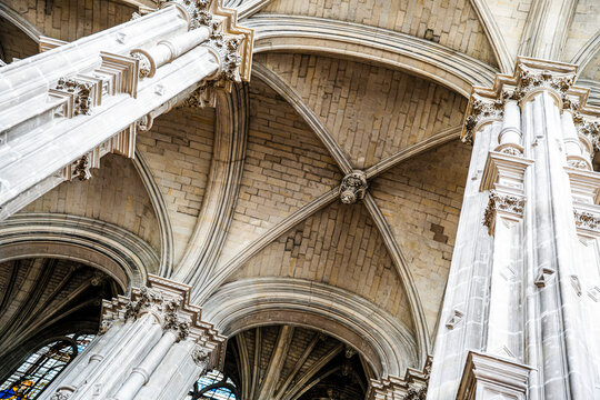 Detail of vaulted ceiling with hanging keystone inside Eglise Saint Eustache, gothic architectural element and structural design, in Paris, France