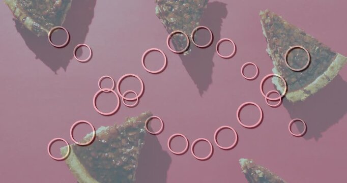 On loop start animated rings forming twin loops, crossing center, darkening slices, aiding food ads