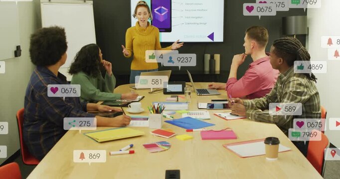 Mustard presenter speaking gesturing, starting icons over table grouping then fading for marketing