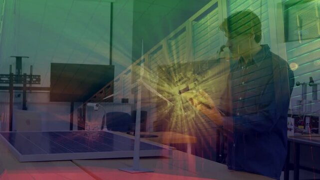 Vertical video: Starburst pulsing, revealing solar panels as tech adjusting meter for test in lab