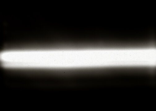  A dark gradient from black to white, a worn surface with a grainy texture and faint scratches, a front view, and a banner with a central text field.