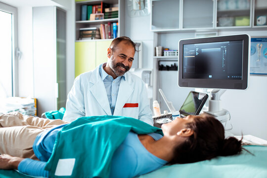 Doctor and patient during ultrasound exam in clinic