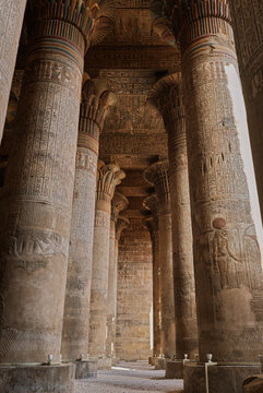 Colonnade and wall reliefs inside the Temple of Khnum in Esna Egypt