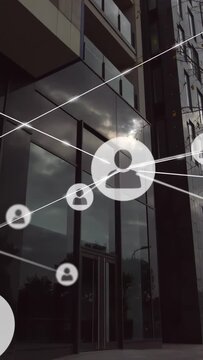 Vertical video: Center icon appearing, sending lines as icons sliding, showing tech net on facade