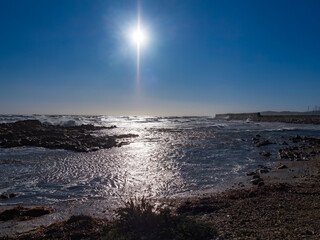 Sunny day with waves crashing on rocky Posada coast © Luc V. de Zeeuw