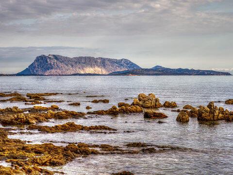 Tavolara Island seascape with rocky coastline in San Teodoro Sardinia