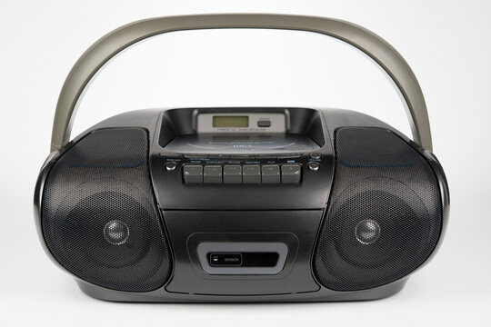 Black portable CD radio cassette player with MP3 playback isolated on white