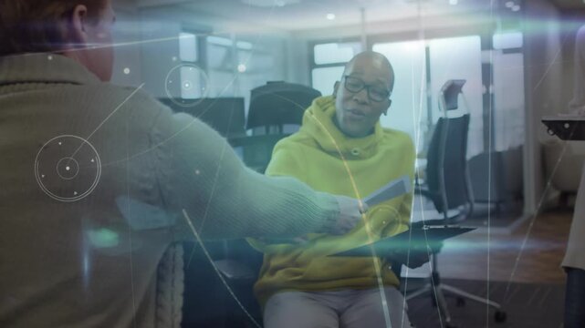 Animation of connections over diverse businesspeople in office