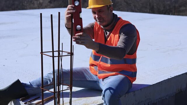 Construction worker working outdoors on a construction site.