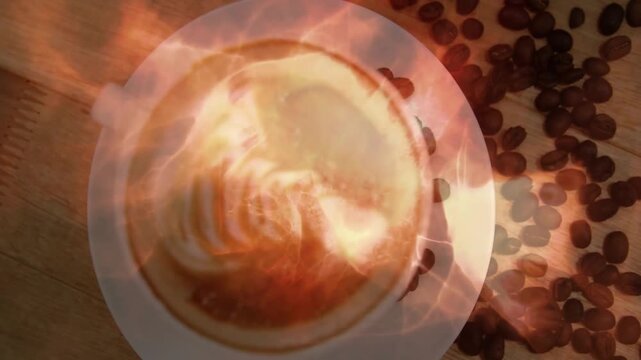 White ceramic coffee cup being displayed in flat design, featuring latte art and scattered beans