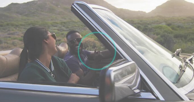 Vertical video: Rider laughing fixing shades driver driving ragtop music sparking dots showing trip