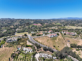 Fototapeta premium Aerial view of Fallbrook, Rainbow Crest, Rainbow Ridge with big mansion and green valley, San Diego County California