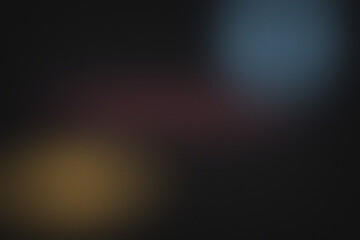 Obraz premium Dark abstract background, with a grainy, texture, featuring soft, out-of-focus light spots, in muted blue, deep purple, and, warm golden yellow