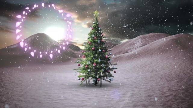 Decorative shining lights against snowflakes falling over christmas tree on winter landscape