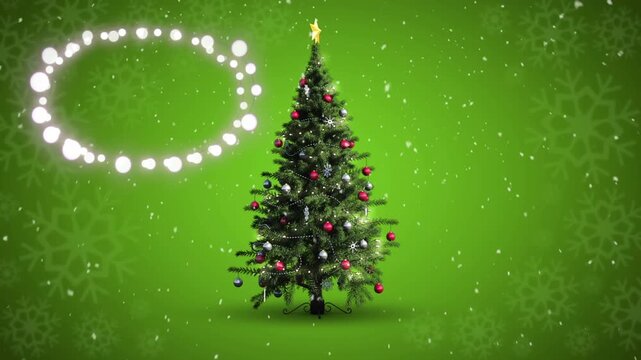 Decorative shining lights against snowflakes falling over christmas tree against green background