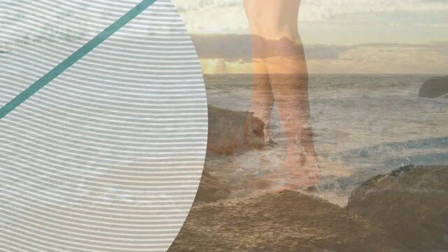 Animation of caucasian woman walking on beach by sea over circle
