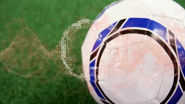 Soccer ball on grass with digital network animation overlaying scene