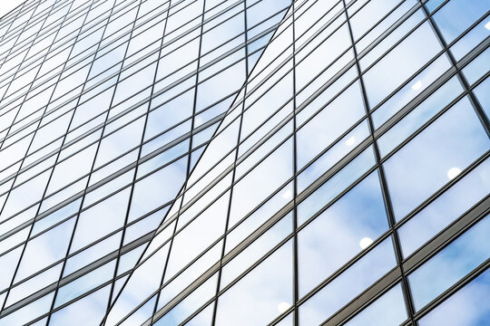 Abstract concept architectural detail of a corporate office building in the financial district of the British capital, London, centre of European investment and banking Industry.