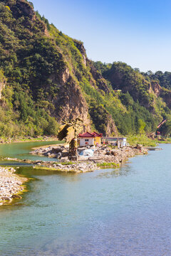 House on an island in the Ju river near Huangyaguan, China
