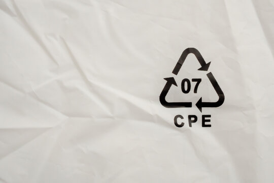 Recycle symbol 07 CPE on white plastic bag, environmental conservation and plastic waste concept