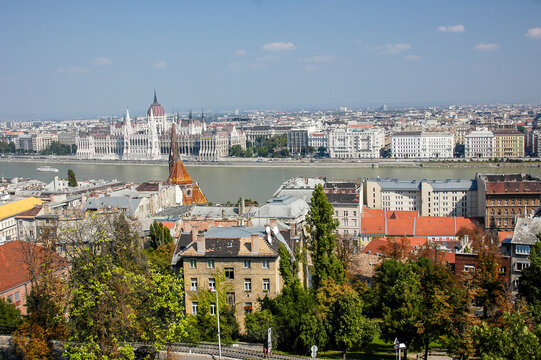 A scenic view of Budapest, Hungary, featuring the Hungarian Parliament Building and the Danube River.