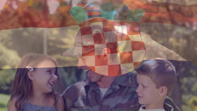 Animation of flag of croatia over happy caucasian soldier father embracing son and daughter