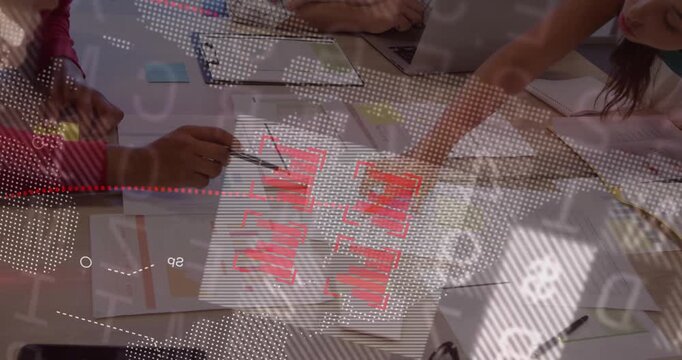 Colleagues lifting pen pointing at red bars displaying global map and data for business analysis