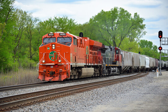 Canadian National Railway's  Elgin, Joliet & Eastern heritage locomotive leads a northbound freight train through northeastern Illinois.