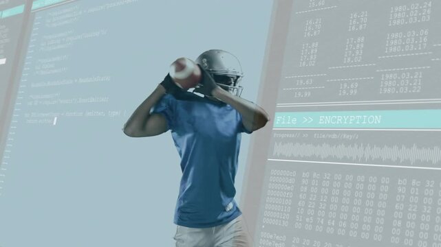 Football player shifting grip winding throwing ball for ad panels behind showing File ENCRYPTION