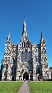 Salisbury Wiltshire England UK. 23.03.2026.  Video.  Anglican Salisbury Cathedral with tallest church spire in the UK seen from Cathedral Close
