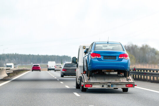 Tow truck hauls a vehicle after a breakdown