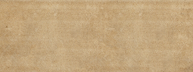 Fototapeta premium Beige textured background showing sand grain surface