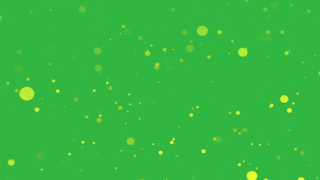 Floating Yellow Bokeh Particles And Glowing Bubbles On Chroma Key Green Screen Background