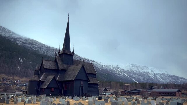 Medieval Wooden Stave Church in Lom Norway at Winter with Snow in the Air 4K Video