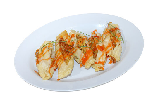 Crispy Fried Dumplings Filled with Noodles and Spicy Sauce Isolated on Transparent Background