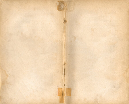 Aged paper texture with fold and tape