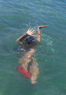 man drowning in water. selective focus.