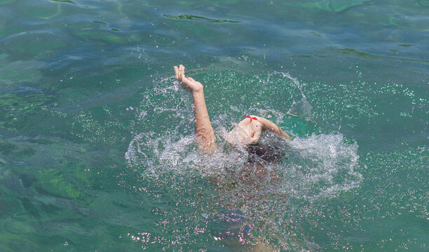 man drowning in water. selective focus.