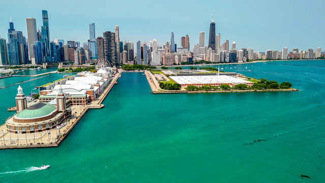 Panoramic drone shot of Navy Pier and Chicago cityscape on a sunny day
