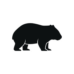 Fototapeta premium Black silhouette of a wombat walking, side view, on a clean white background animal