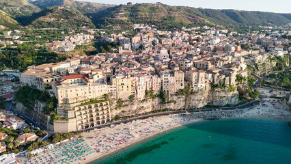 Drone perspective of Tropea in summer showing turquoise sea and scenic coastal landscape