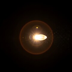Obraz premium A bright light emitting beams with a lens flare effect on a black background, with dust particles scattered