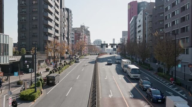 Tokyo Scene  :  Urban Beltway Lined With High-Rise Buildings on Both Sides on a Sunny Day  |  Shibuya, Tokyo, Japan