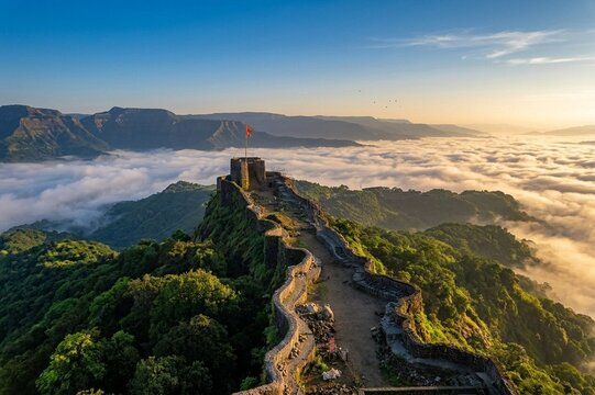 Cloud inversion at Pratapgad fort during sunrise, Mahabaleshwar, Maharashtra.