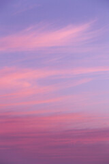 Obraz premium Beautiful soft gentle sunrise, sunset pink violet blue sky with clouds abstract background texture