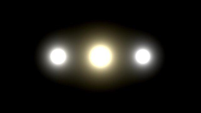 Abstract circular light animation with glowing particles on a black background