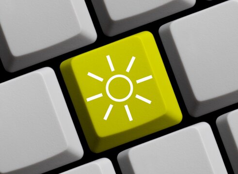 Computer Tastatur in gelb: Sonne und Solarenergie